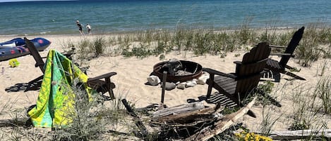 On the beach, sun-loungers, beach towels