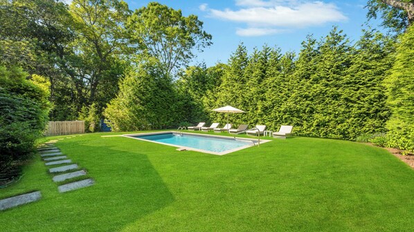 A heated pool - Charming shingled home surrounded by beautiful landscaping and nature,... (East Hampton)