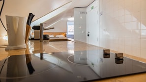 Fridge, microwave, stovetop, coffee/tea maker