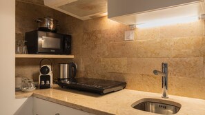Fridge, microwave, stovetop, coffee/tea maker