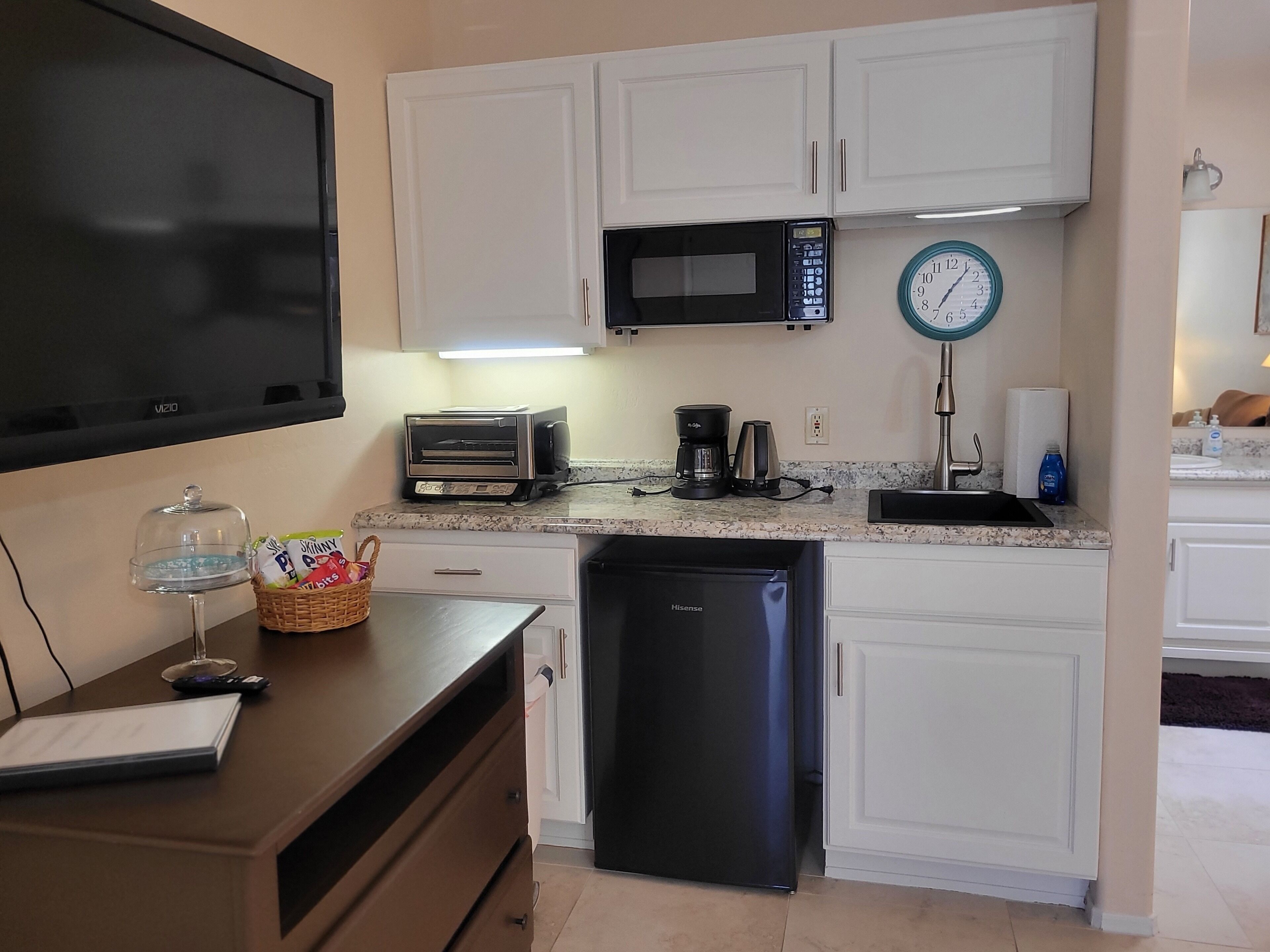 Fridge, microwave, coffee/tea maker, toaster