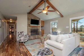 TV, fireplace, stereo - Lakefront House with Hot Tub, Dock, Game Room (Hot Springs)