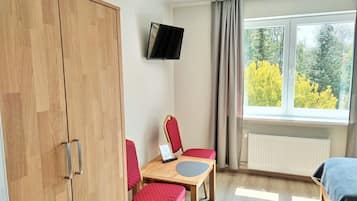 Standard Double or Twin Room | Down comforters, laptop workspace, blackout drapes, free WiFi