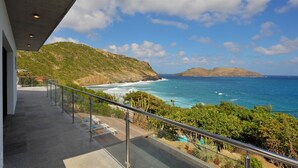 A balcony with a view of the ocean and hills. - Eranos (1/2 Rooms) Luxury villa (St. Barts)