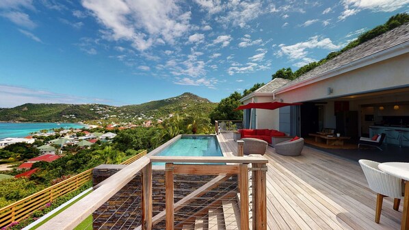 A rooftop pool with a view of a coastal town and hills. - Nita (2/3 Rooms) Luxury villa (St. Barts)