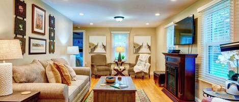 Smart TV, chimenea, reproductor de DVD y oficina