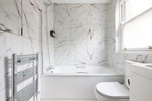 Combined shower/bathtub, hair dryer