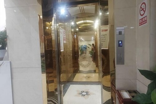 Q+ Treasure Palace Hotel