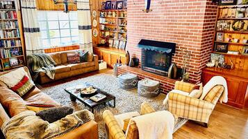 Smart TV, fireplace, table tennis, books