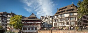 A traditional half-timbered building with a steeply pitched roof and a visible chimney. - ❤ LE COCON ❤ Historic Center ➡ ALL-INCLUSIVE STUDIO ★ (Strasbourg)