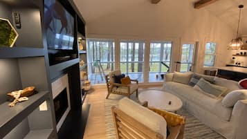 Smart TV, fireplace, books