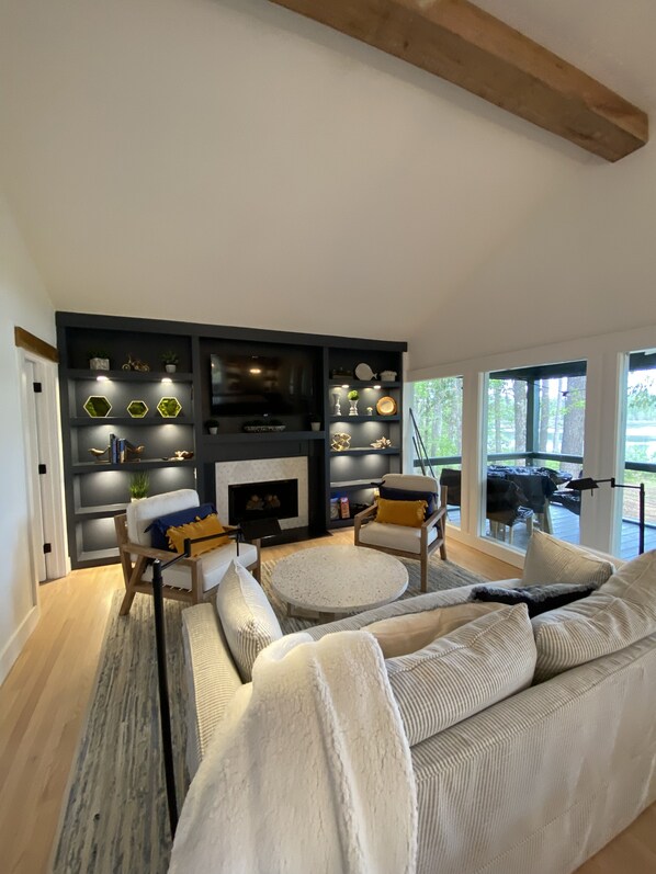 Smart TV, fireplace, books