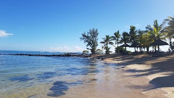 On the beach, white sand