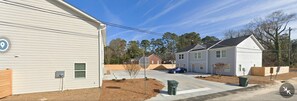 Houses with simple, functional design and front yards.