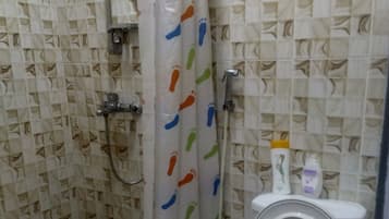 Shower, towels, soap, toilet paper