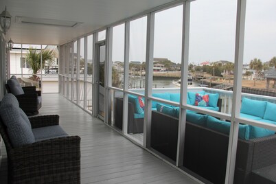 Waterfront 5-Bedroom Home with Hot Tub & Amenities