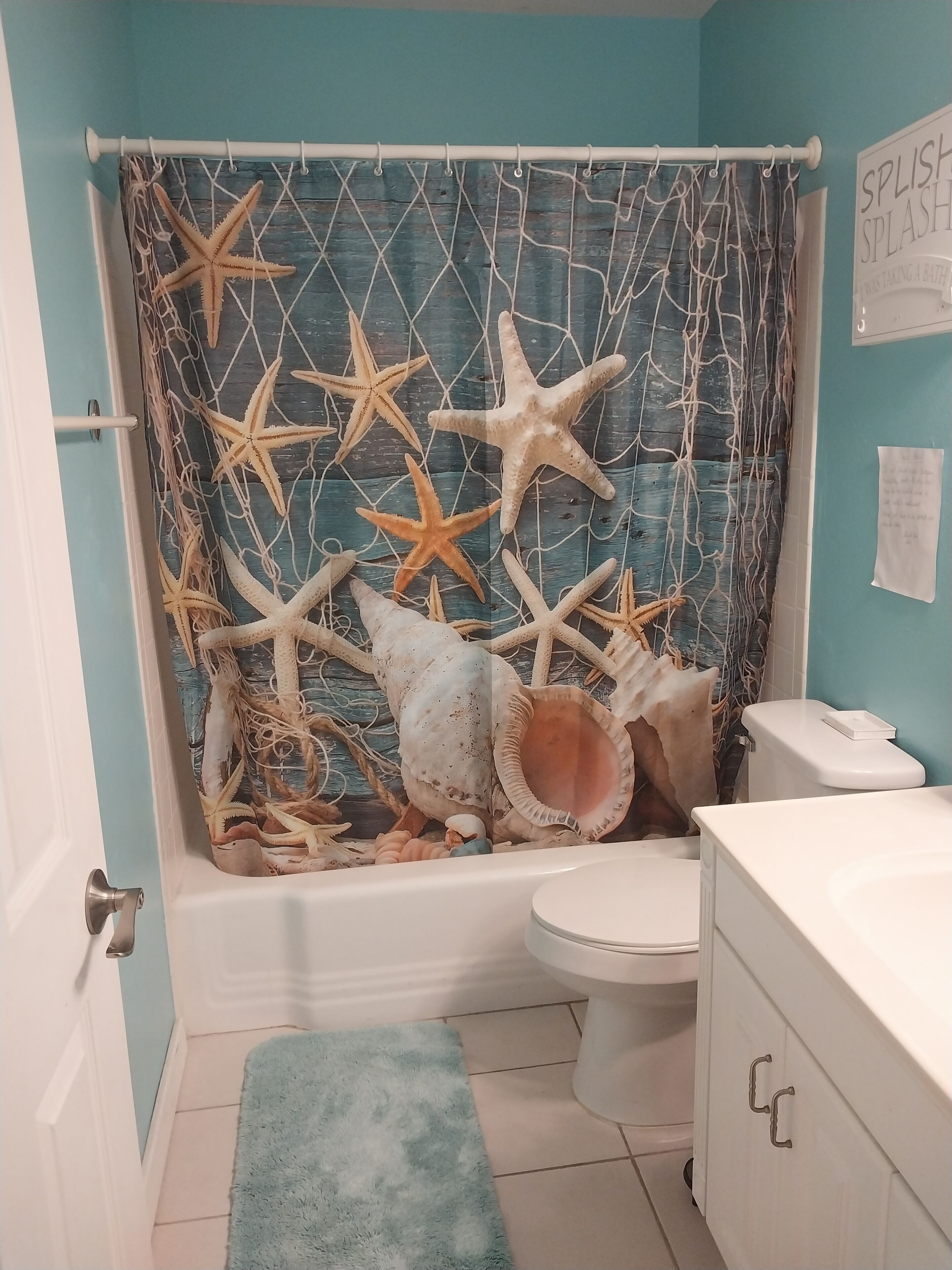 Combined shower/bathtub, hair dryer, towels, soap