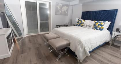 Nchanted 1BR Luxury Retreat near Airport and Sports Complex w/ Yard and Parking