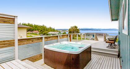 Updated Water View Gem with Deck, BBQ/Outdoor Dining, Hot Tub, Fireplace, & WiFi