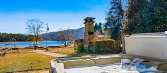 Lakefront cottage with private dock, hot tub, fireplace & game room