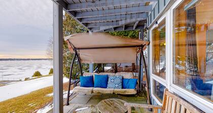 Scenic lakefront home with gas fireplace, high-speed WiFi, & patio