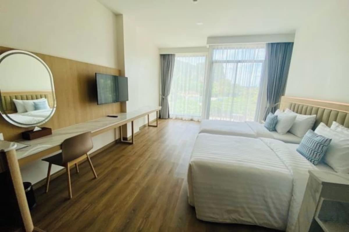 Luxe beddengoed, pillowtop-bedden, een minibar, een kluis op de kamer