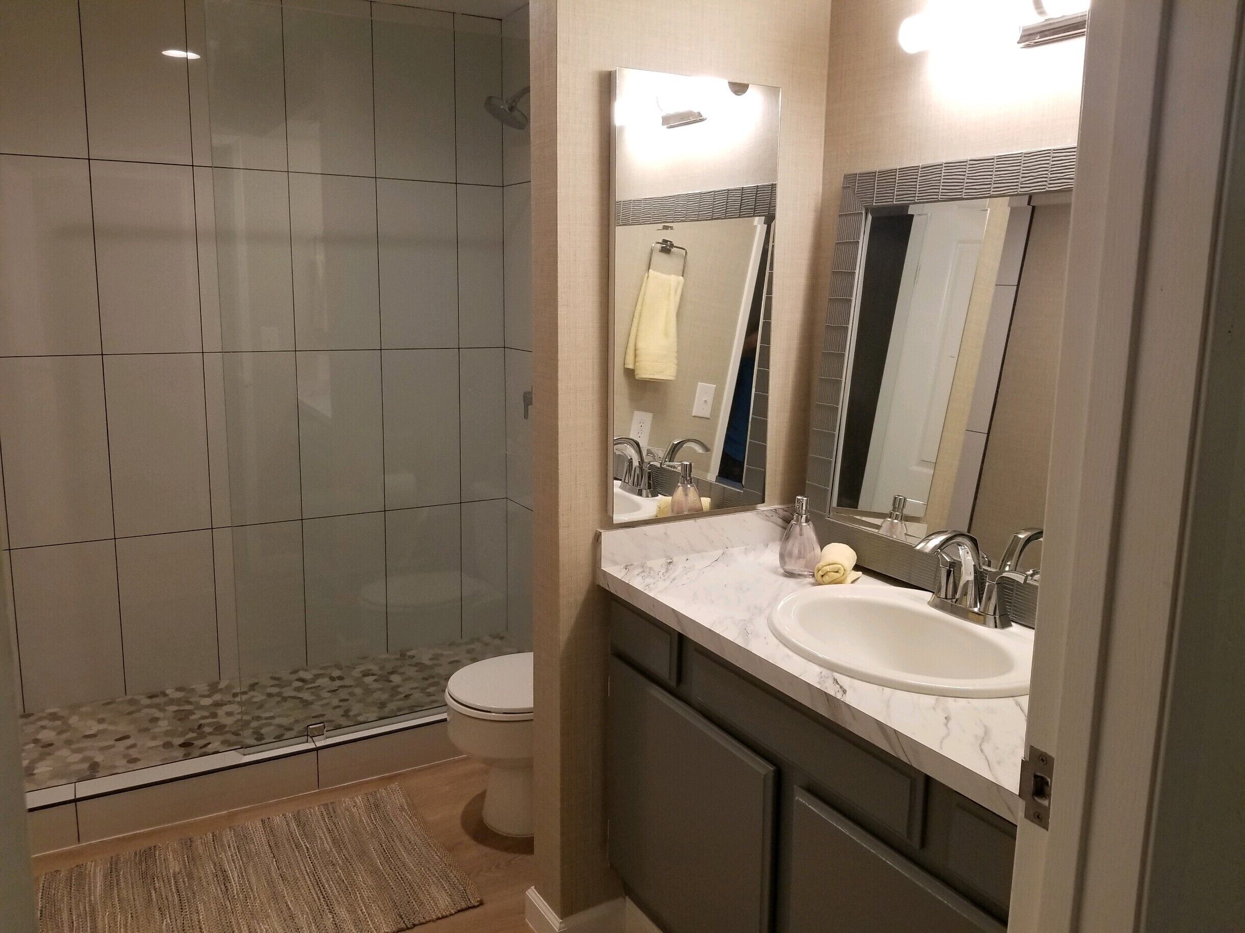 Shower, towels, soap, toilet paper