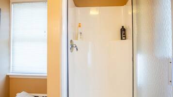Combined shower/tub, hair dryer, towels, soap