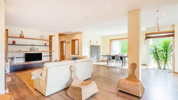 Villa, 3 Bedrooms, Terrace, Garden View | Living area | 50-cm flat-screen TV with cable channels, TV, fireplace