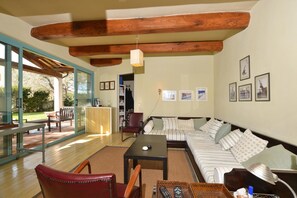 Family House, Multiple Bedrooms, 2 Bathrooms, Mountainside (Chalet Vignarola) | Living area | 21-inch TV with cable channels - Chalet Vignarola (Orbetello)