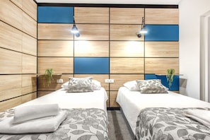Desk, laptop workspace, free WiFi, bed sheets