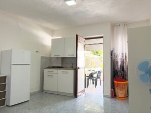 Fridge, stovetop, cookware/dishes/utensils