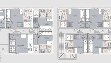 Een plattegrond van een hotel met meerdere woonkamers, badkamers, een keuken en een gedeelte met wasmachines en een droger.