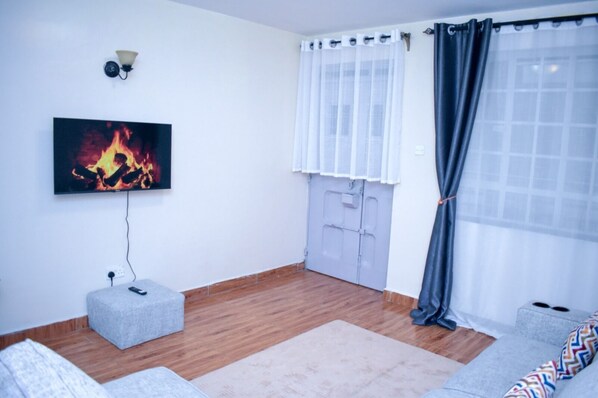 Deluxe Apartment | Living area - Dream house (Nairobi)
