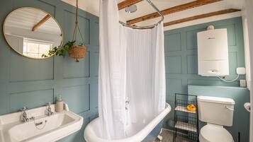 Bathtub, hair dryer, towels