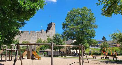 Idyllic mill building directly on the city wall with a large garden