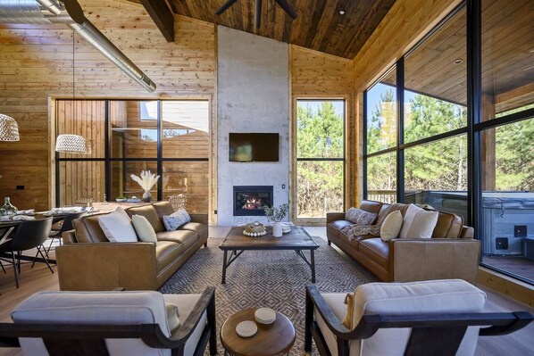 TV, fireplace - Sunlit Spaces • 6-Bunk Room • Big Porch Fun (Broken Bow)