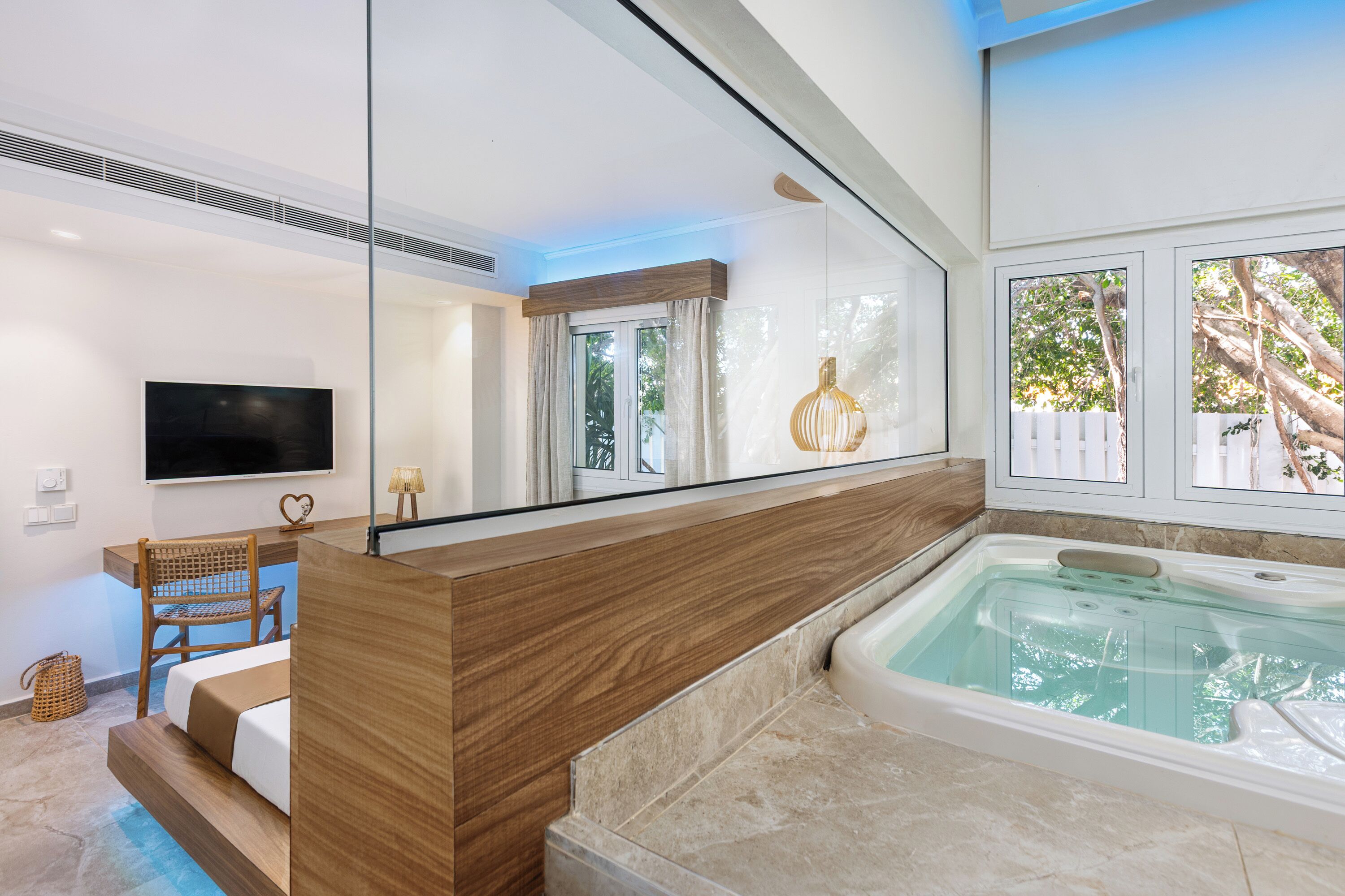 SPA One Bedroom Suite Jacuzzi with Pool View | In-room safe, desk, blackout drapes, soundproofing