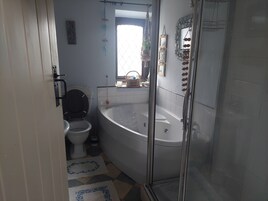 Cottage | Bathroom | Separate tub and shower, deep soaking tub, hair dryer, towels