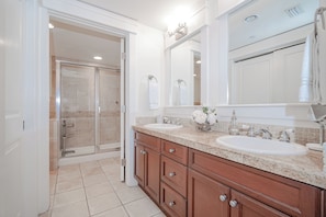 Bathtub, hair dryer, towels, soap