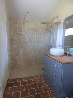Shower, hair dryer, towels, toilet paper
