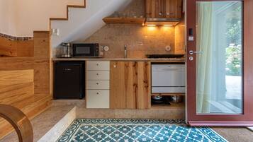 Fridge, microwave, stovetop, coffee/tea maker