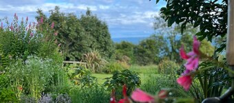 The Pink Cottage Upstairs Suite and Secret Garden... beautiful walks & sea view.