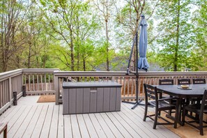 Enjoy al fresco dining on the deck with a barbecue grill and comfortable seating.