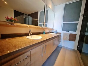Shower, hair dryer, towels, soap