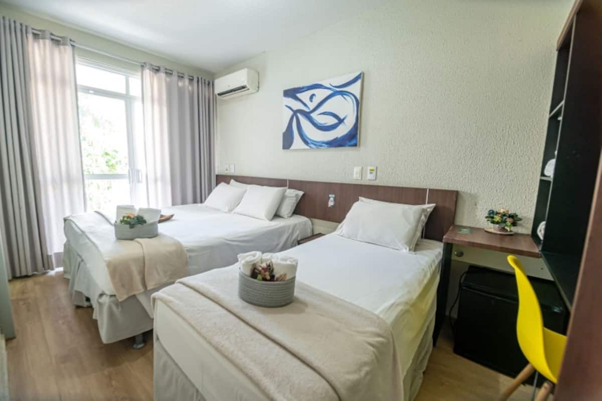 Triple Room, Patio | Minibar, free WiFi, bed sheets
