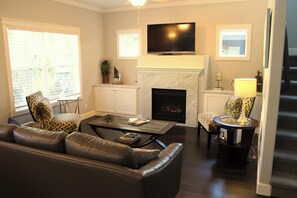 Smart TV, fireplace, DVD player, books