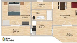 A floor plan of a hotel room with a balcony, a living room, a kitchen, a bathroom, and a bedroom. - Superior apartment with 2 balconies with lake and mountain view (Starfach)