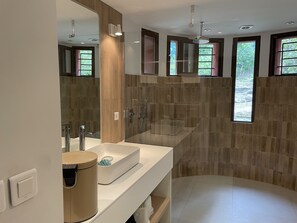 Bathtub, towels, toilet paper