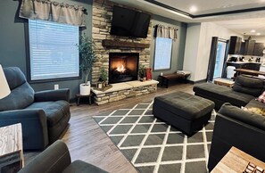 Smart TV, fireplace, books